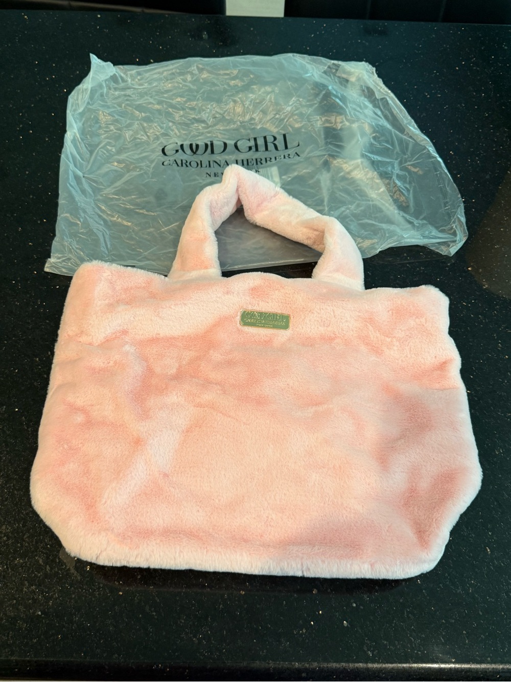 Beautiful Carolina Herrera Pink Faux Fur Tote with Gold Logo Plaque